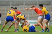 13 June 2021; Roscommon players, from left, Conor Hussey Cathal Cregg, Diaruid Murtagh and Tadhg O'Rourke battle for possession with Ciaran Mackin, left, and Rian O'Neill of Armagh during the Allianz Football League Division 1 Relegation play-off match between Armagh and Roscommon at Athletic Grounds in Armagh. Photo by Ramsey Cardy/Sportsfile