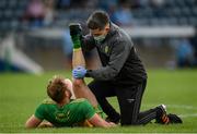 12 June 2021; Stephen McMenamin of Donegal receives medical attention from Donegal physiotherapist Cathal Ellis during the Allianz Football League Division 1 semi-final match between Donegal and Dublin at Kingspan Breffni Park in Cavan. Photo by Stephen McCarthy/Sportsfile