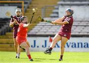 13 June 2021; Amy O'Connor of Cork in action against Sarah Healy of Galway during the Littlewoods Ireland National Camogie League Division 1 Semi-Final match between Cork and Galway at Nowlan Park in Kilkenny.  Photo by Matt Browne/Sportsfile