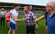 13 June 2021; Conor McManus of Monaghan is congratulated by the suspended Monaghan manager Seamus McEnaney, who was at the game as a spectator, after the Allianz Football League Division 1 Relegation play-off match between Monaghan and Galway at St. Tiernach’s Park in Clones, Monaghan. Photo by Ray McManus/Sportsfile