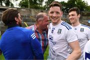 13 June 2021; Conor McManus of Monaghan is congratulated by suspended Monaghan manager Seamus McEnaney, who was at the game as a spectator, after the Allianz Football League Division 1 Relegation play-off match between Monaghan and Galway at St. Tiernach’s Park in Clones, Monaghan. Photo by Ray McManus/Sportsfile