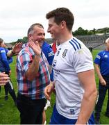 13 June 2021; Darren Hughes of Monaghan is congratulated by suspended Monaghan manager Seamus McEnaney, who was at the game as a spectator, after the Allianz Football League Division 1 Relegation play-off match between Monaghan and Galway at St. Tiernach’s Park in Clones, Monaghan. Photo by Ray McManus/Sportsfile