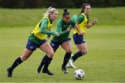 13 June 2021; Saoirse Noonan, left, and Rianna Jarret compete for the ball during a Republic of Ireland training session at Laugardalsvollur in Reykjavik, Iceland. Photo by Eythor Arnason/Sportsfile