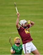 13 June 2021; Derek McNicholas of Westmeath in action against Brian O’Grady of Limerick during the Allianz Hurling League Division 1 Group A Round 5 match between Westmeath and Limerick at TEG Cusack Park in Mullingar, Westmeath. Photo by Seb Daly/Sportsfile