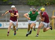 13 June 2021; Conor Boylan of Limerick in action against Ciaran Doyle, left, and Aaron Craig of Westmeath during the Allianz Hurling League Division 1 Group A Round 5 match between Westmeath and Limerick at TEG Cusack Park in Mullingar, Westmeath. Photo by Seb Daly/Sportsfile