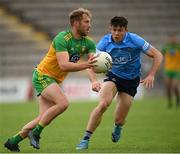 12 June 2021; Stephen McMenamin of Donegal in action against David Byrne of Dublin during the Allianz Football League Division 1 semi-final match between Donegal and Dublin at Kingspan Breffni Park in Cavan. Photo by Stephen McCarthy/Sportsfile