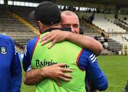 13 June 2021; Monaghan interim manager Vinny Corey is congratulated by the suspended Monaghan manager Seamus McEnaney, who was at the game as a spectator, after the Allianz Football League Division 1 Relegation play-off match between Monaghan and Galway at St. Tiernachâ€™s Park in Clones, Monaghan. Photo by Philip Fitzpatrick/Sportsfile