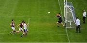 13 June 2021; Karl O'Connell of Monaghan under pressure from Galway players Seán Mulkerrin and Eamonn Brannigan, left, has his shot on goal deflected over the bar, by Galway goalkeeper Conor Gleeson, for a point during the Allianz Football League Division 1 Relegation play-off match between Monaghan and Galway at St. Tiernach’s Park in Clones, Monaghan. Photo by Ray McManus/Sportsfile