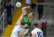 13 June 2021; Conor McGill of Meath punches the ball clear from Brian McLoughlin of Kildare during the Allianz Football League Division 2 semi-final match between Kildare and Meath at St Conleth's Park in Newbridge, Kildare. Photo by Piaras Ó Mídheach/Sportsfile