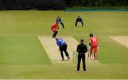 15 June 2021; Craig Young of North West Warriors bowls to Murray Commins of Munster Reds during the Cricket Ireland InterProvincial Cup 2021 match between Munster Reds and North West Warriors at The Mardyke in Cork.  Photo by Matt Browne/Sportsfile