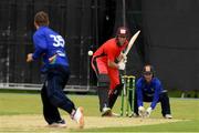 15 June 2021; Jack Carty of Munster Reds plays a bowl from Andy McBrine of North West Warriors during the Cricket Ireland InterProvincial Cup 2021 match between Munster Reds and North West Warriors at The Mardyke in Cork.  Photo by Matt Browne/Sportsfile