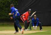 15 June 2021; Murray Commins of Munster Reds plays a bowl from Andy McBrine of North West Warriors during the Cricket Ireland InterProvincial Cup 2021 match between Munster Reds and North West Warriors at The Mardyke in Cork.  Photo by Matt Browne/Sportsfile