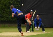 15 June 2021; Murray Commins of Munster Reds plays a bowl from Andy McBrine of North West Warriors during the Cricket Ireland InterProvincial Cup 2021 match between Munster Reds and North West Warriors at The Mardyke in Cork.  Photo by Matt Browne/Sportsfile