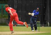 15 June 2021; William Porterfield of North West Warriors plays a bowl from Josh Manley of Munster Reds during the Cricket Ireland InterProvincial Cup 2021 match between Munster Reds and North West Warriors at The Mardyke in Cork.  Photo by Matt Browne/Sportsfile