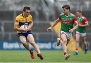 13 June 2021; Cillian Brennan of Clare in action against Lee Keegan of Mayo during the Allianz Football League Division 2 semi-final match between Clare and Mayo at Cusack Park in Ennis, Clare. Photo by Brendan Moran/Sportsfile