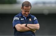 13 June 2021; Clare manager Colm Collins checks his watch before the Allianz Football League Division 2 semi-final match between Clare and Mayo at Cusack Park in Ennis, Clare. Photo by Brendan Moran/Sportsfile