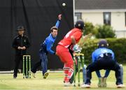 18 June 2021; JJ Garth of Leinster Lightning bowls to Tyrone Kane of Munster Reds during the Cricket Ireland InterProvincial Trophy 2021 match between Leinster Lightning and Munster Reds at Pembroke Cricket Club in Dublin. Photo by Matt Browne/Sportsfile