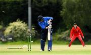 18 June 2021; Kevin O'Brien of Leinster Lightning loses his wicket to the bowl from Aaron Cawley of Munster Reds during the Cricket Ireland InterProvincial Trophy 2021 match between Leinster Lightning and Munster Reds at Pembroke Cricket Club in Dublin. Photo by Matt Browne/Sportsfile