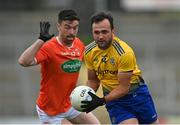 13 June 2021; Donie Smith of Roscommonin action against Aidan Forker of Armagh during the Allianz Football League Division 1 Relegation play-off match between Armagh and Roscommon at Athletic Grounds in Armagh. Photo by Ramsey Cardy/Sportsfile