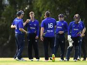 18 June 2021; Graham Kennedy of North West Warriors is congratulated by his team-mates after taking the wicket of James McCollum of Northern Knights during the Cricket Ireland InterProvincial Trophy 2021 match between Northern Knights and North West Warriors at Pembroke Cricket Club in Dublin. Photo by Matt Browne/Sportsfile