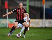 18 June 2021; Georgie Kelly of Bohemians in action against Jake Hyland of Drogheda United during the SSE Airtricity League Premier Division match between Bohemians and Drogheda United at Dalymount Park in Dublin. Photo by Piaras Ó Mídheach/Sportsfile