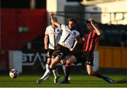 18 June 2021; Sam Stanton of Dundalk in action against Rob Manley of Longford Town during the SSE Airtricity League Premier Division match between Dundalk and Longford Town at Oriel Park in Dundalk, Louth. Photo by Eóin Noonan/Sportsfile