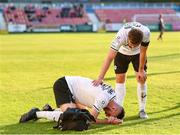 18 June 2021; Robbie McCourt of Sligo Rovers is consoled by Greg Bolger of Sligo Rovers after getting injured during the SSE Airtricity League Premier Division match between St Patrick's Athletic and Sligo Rovers at Richmond Park in Dublin. Photo by Harry Murphy/Sportsfile