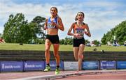 19 June 2021; Lauren Tinkler of Dublin City Harriers AC, Dublin, left, competing in the Under 23 Women's 5000m, along side Holly Brennan of Cilles AC, Meath, competing in the Junior Women's 5000m, during day one of the Irish Life Health Junior Championships & U23 Specific Events at Morton Stadium in Santry, Dublin. Photo by Sam Barnes/Sportsfile