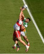 19 June 2021; Conor Glass of Derry in action against Eoin Carroll of Offaly during the Allianz Football League Division 3 Final match between Derry and Offaly at Croke Park in Dublin. Photo by Ray McManus/Sportsfile