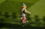 19 June 2021; Gareth McKinless of Derry in action against David Dempsey of Offaly during the Allianz Football League Division 3 Final match between Derry and Offaly at Croke Park in Dublin. Photo by Ray McManus/Sportsfile