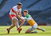 19 June 2021; Emmett Bradley of Derry gets away from Peter Cunningham of Offaly during the Allianz Football League Division 3 Final match between Derry and Offaly at Croke Park in Dublin. Photo by Piaras Ó Mídheach/Sportsfile