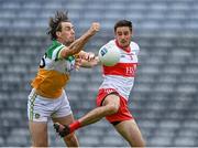 19 June 2021; Niall McNamee of Offaly in action against Christopher McKaigue of Derry during the Allianz Football League Division 3 Final match between Derry and Offaly at Croke Park in Dublin. Photo by Piaras Ó Mídheach/Sportsfile