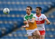 19 June 2021; Niall McNamee of Offaly in action against Christopher McKaigue of Derry during the Allianz Football League Division 3 Final match between Derry and Offaly at Croke Park in Dublin. Photo by Piaras Ó Mídheach/Sportsfile