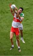 19 June 2021; Shane McGuigan of Derry in action against Eoin Rigney of Offaly during the Allianz Football League Division 3 Final match between Derry and Offaly at Croke Park in Dublin. Photo by Ray McManus/Sportsfile