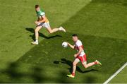 19 June 2021; David Dempsey of Offaly shadows Gareth McKinless of Derry during the Allianz Football League Division 3 Final match between between Derry and Offaly at Croke Park in Dublin. Photo by Ray McManus/Sportsfile