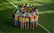 19 June 2021; The Offaly starting 15 in a huddle before the Allianz Football League Division 3 Final match between between Derry and Offaly at Croke Park in Dublin. Photo by Ray McManus/Sportsfile