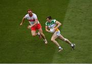 19 June 2021; Johnny Moloney of Offaly in action against Conor Glass of Derry during the Allianz Football League Division 3 Final match between between Derry and Offaly at Croke Park in Dublin. Photo by Ray McManus/Sportsfile