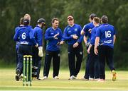 20 June 2021; North West Warriors players celebrate the wicket of Lorcan Tucker of Leinster Lightning during the Cricket Ireland InterProvincial Trophy 2021 match between Leinster Lightning and North West Warriors at Pembroke Cricket Club in Dublin. Photo by Harry Murphy/Sportsfile