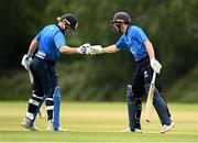 20 June 2021; Lorcan Tucker of Leinster Lightning, right, is congratulated by Jamie Grassi of Leinster Lightning after reaching 50 during the Cricket Ireland InterProvincial Trophy 2021 match between Leinster Lightning and North West Warriors at Pembroke Cricket Club in Dublin. Photo by Harry Murphy/Sportsfile