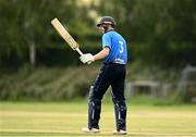 20 June 2021; Lorcan Tucker of Leinster Lightning raises his bat after reaching 50 during the Cricket Ireland InterProvincial Trophy 2021 match between Leinster Lightning and North West Warriors at Pembroke Cricket Club in Dublin. Photo by Harry Murphy/Sportsfile