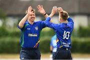 20 June 2021; Kyle Magee of North West Warriors, right, celebrates a wicket with Andy McBrine during the Cricket Ireland InterProvincial Trophy 2021 match between Leinster Lightning and North West Warriors at Pembroke Cricket Club in Dublin. Photo by Harry Murphy/Sportsfile
