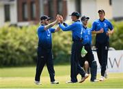 20 June 2021; Jamie Grassi of Leinster Lightning , left, celebrates a wicket with team-mate Tim Tector during the Cricket Ireland InterProvincial Trophy 2021 match between Leinster Lightning and North West Warriors at Pembroke Cricket Club in Dublin. Photo by Harry Murphy/Sportsfile