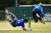 20 June 2021; Craig Young of North West Warriors dives in to win the match between despite the run out attempt of Lorcan Tucker of Leinster Lightning during the Cricket Ireland InterProvincial Trophy 2021 match between Leinster Lightning and North West Warriors at Pembroke Cricket Club in Dublin. Photo by Harry Murphy/Sportsfile