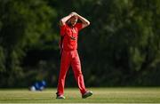 20 June 2021; Aaron Cawley of Munster Reds reacts during the Cricket Ireland InterProvincial Trophy 2021 match between Northern Knights and Munster Reds at Pembroke Cricket Club in Dublin. Photo by Harry Murphy/Sportsfile