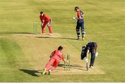 20 June 2021; Fionn Hand of Munster Reds attempts to run out Luke Georgeson of Northern Knights during the Cricket Ireland InterProvincial Trophy 2021 match between Northern Knights and Munster Reds at Pembroke Cricket Club in Dublin. Photo by Harry Murphy/Sportsfile