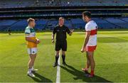 19 June 2021; Referee Seán Lonergan with team captains Niall Darby of Offaly and Christopher McKaigue of Derry before the Allianz Football League Division 3 Final match between Derry and Offaly at Croke Park in Dublin. Photo by Piaras Ó Mídheach/Sportsfile