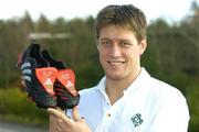 11 February 2004; Ireland out-half Ronan O'Gara with customised adidas boots bearing a heart symbol for Valentines Day, the players will wear these boots for the Six Nations game between Ireland and France at the Stade de France on Saturday 14th, which is Valentines Day. The boots will then be auctioned in aid of the Irish Heart Foundation. Picture credit; Brendan Moran / SPORTSFILE *EDI*