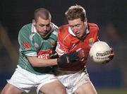 14 February 2004; Conor McCarthy, Cork, in action against Trevor Mortimer, Mayo. Allianz National Football League, Division 1A, Cork v Mayo, Pairc Ui Rinn, Cork. Picture credit; Damien Eagers / SPORTSFILE *EDI*