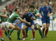 14 February 2004; Girvan Dempsey,left, and Donnacha O'Callaghan, Ireland, in action against Frederic Michalak, France. RBS 6 Nations Championship 2003-2004, France v Ireland, Stade de France, St. Denis, Paris, France. Picture credit; Matt Browne / SPORTSFILE *EDI*