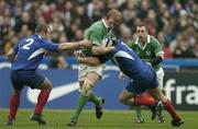 14 February 2004; Paul O'Connell, Ireland, in action against William Servat (2) and Pieter De Villiers, France. RBS 6 Nations Championship 2003-2004, France v Ireland, Stade de France, St. Denis, Paris, France. Picture credit; Brendan Moran / SPORTSFILE *EDI*